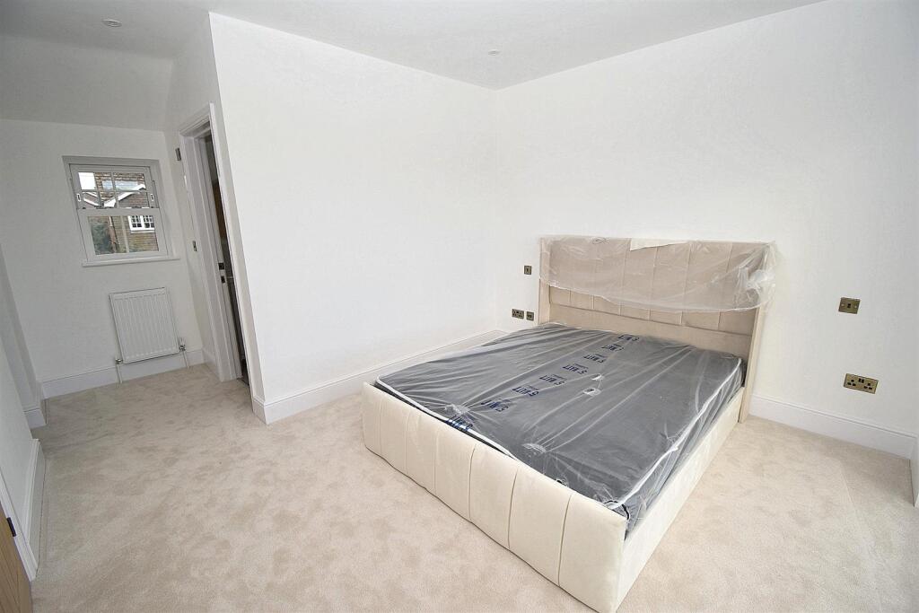 BEDROOM ONE REVERSE.JPG
