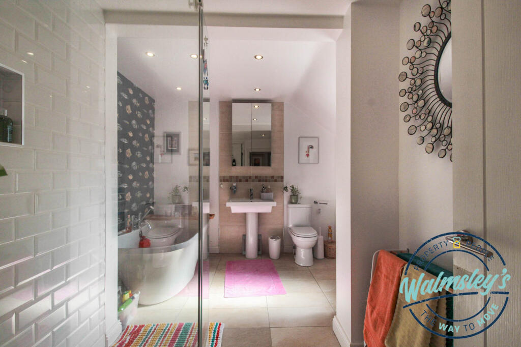 Four piece extended bathroom