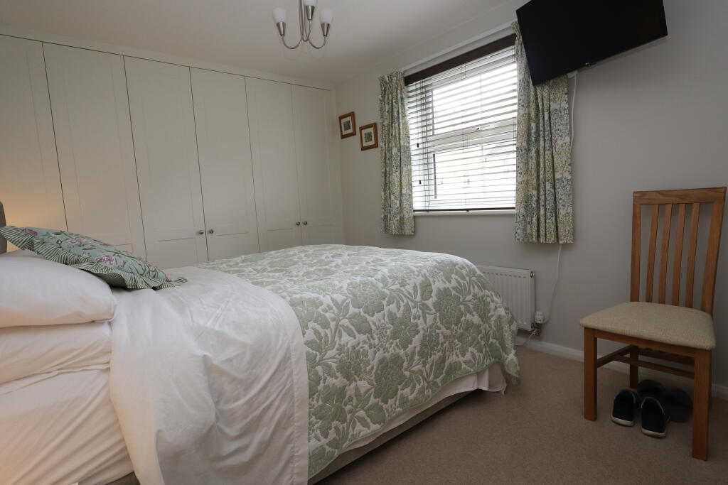 Bedroom 1 with fitted wardrobes