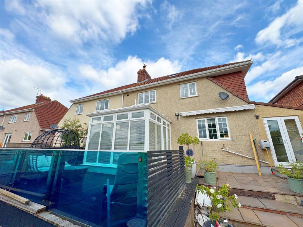 Rear view of property and decking.jpg