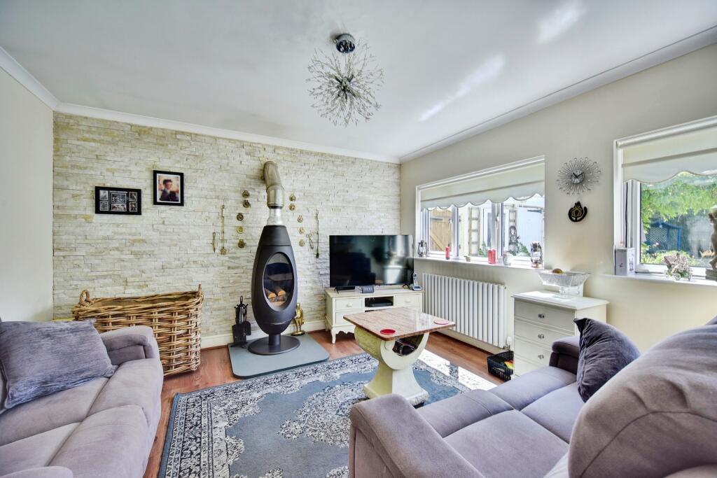 Open Plan Lounge With Log Burner