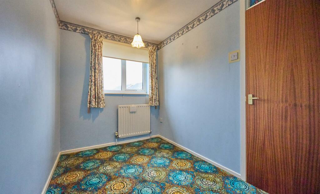 BEDROOM TWO TO REAR
