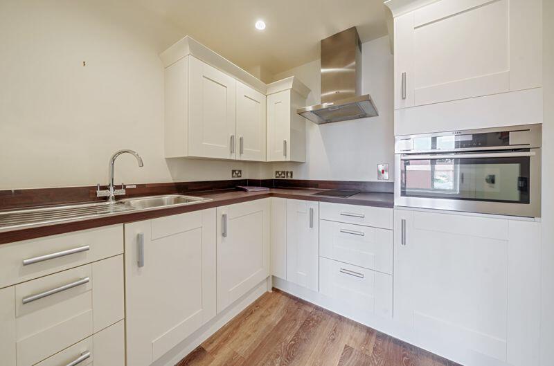 Kitchen with built-in appliances