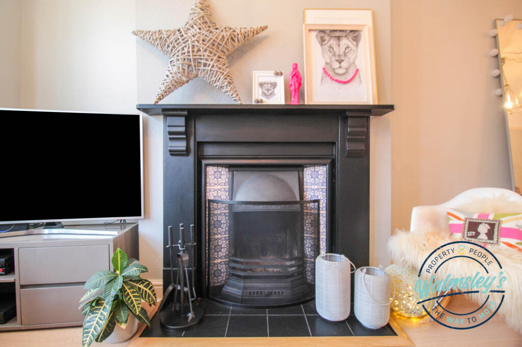Sitting room open fireplace