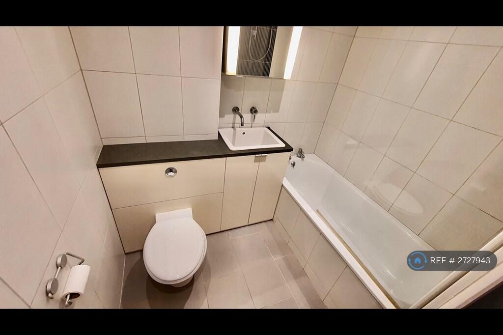 Bathroom With Shower Over Bath