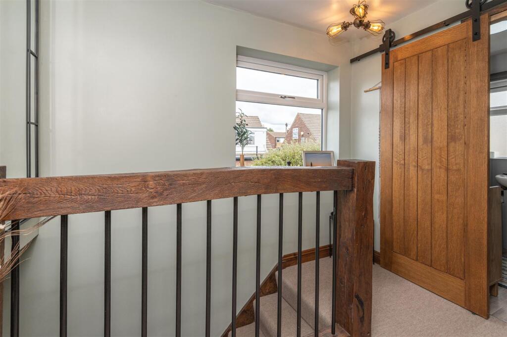 Landing with Beautiful Bannisters