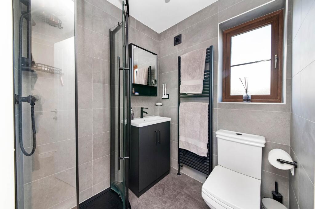 BEDROOM ONE EN-SUITE SHOWER ROOM