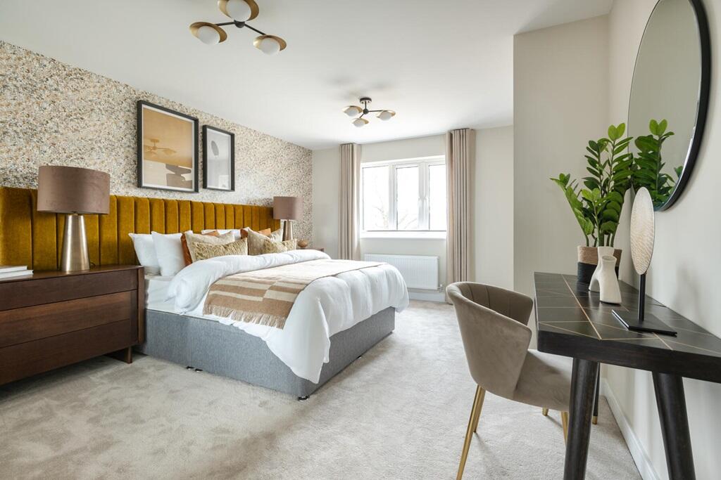 A spacious main bedroom gives you ample room to relax