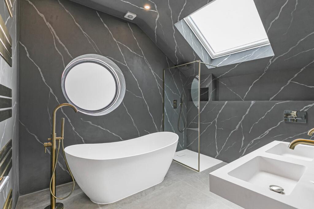 property in Grand Drive, 
Raynes Park, SW20