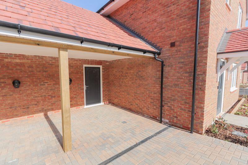 Car Port &amp; Enclosed Garden Store