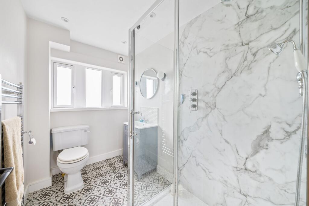 BEDROOM ONE EN-SUITE SHOWER ROOM