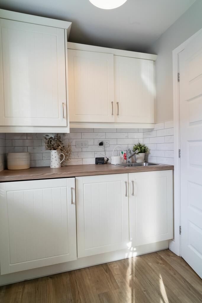 FAMILY ROOM AND UTILITY ROOM