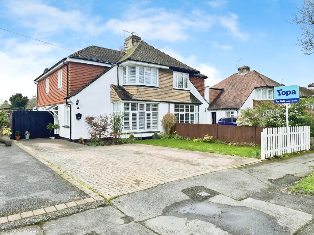 Outside View Of The Property With Driveway Parking
