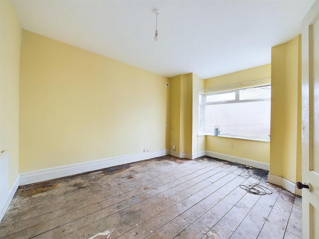 3 - END TERRACED HOUSE ARRANGED AS 2 FLATS.jpg