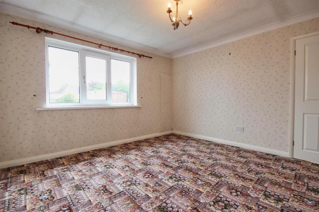 BEDROOM 1 (REAR)