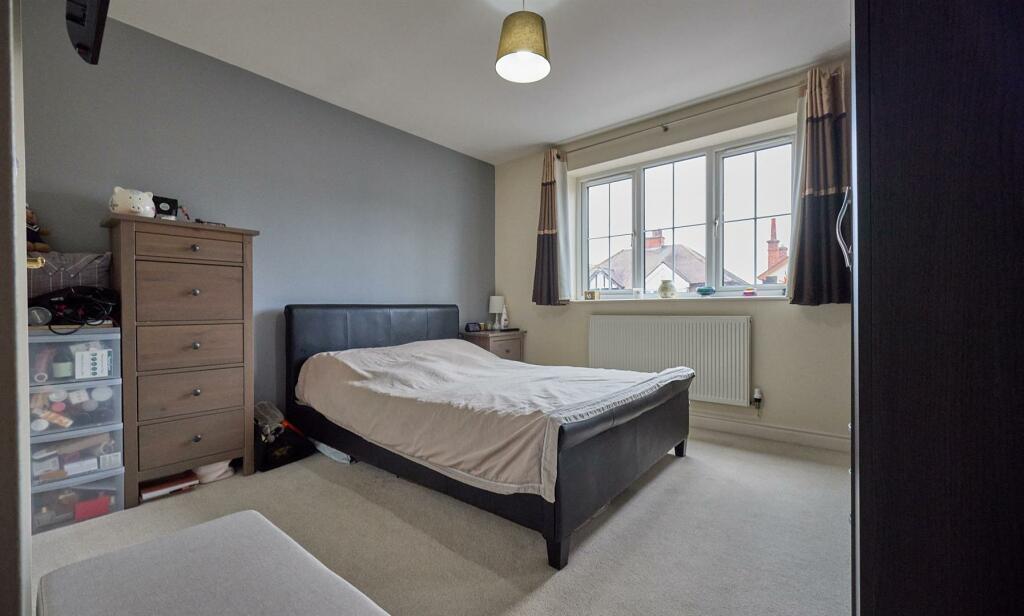 FRONT BEDROOM ONE