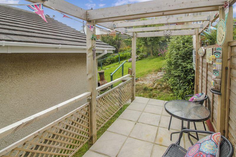 side pergola and patio