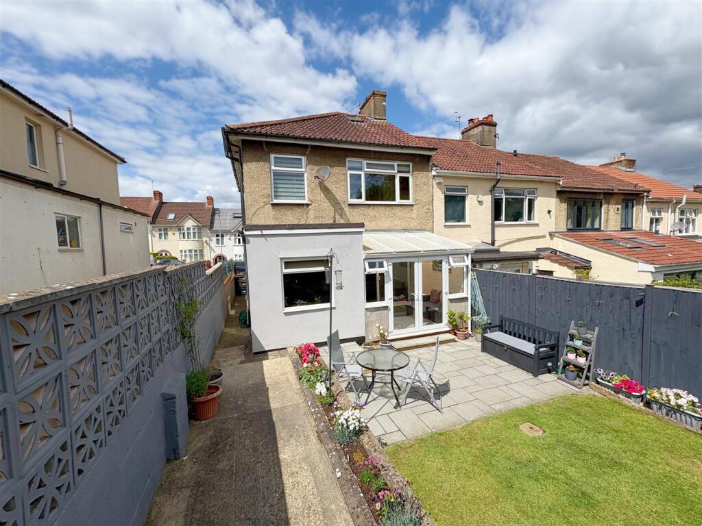 Rear view of property and patio.jpg