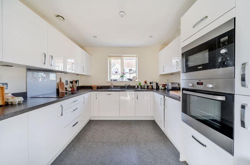 Kitchen with built-in appliances