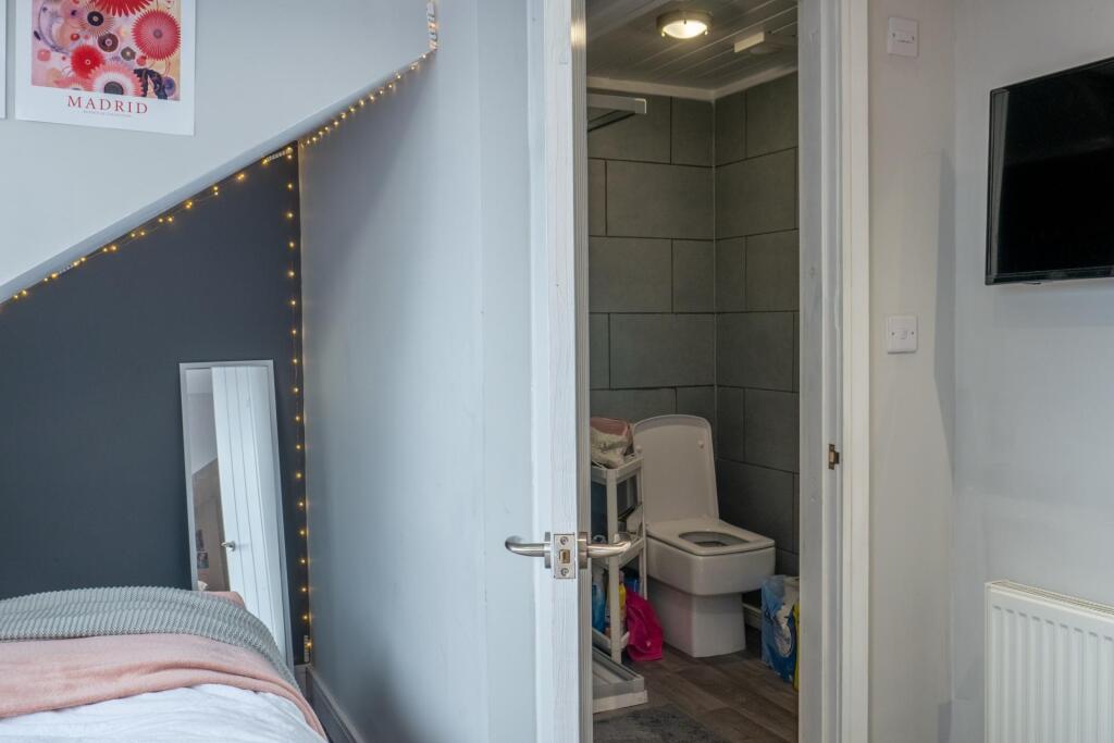 A clean and well-maintained bathroom with moder...
