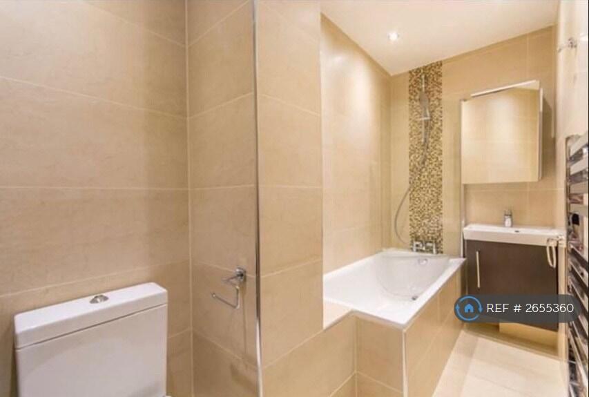 Bathroom With Bath, Shower And Storage