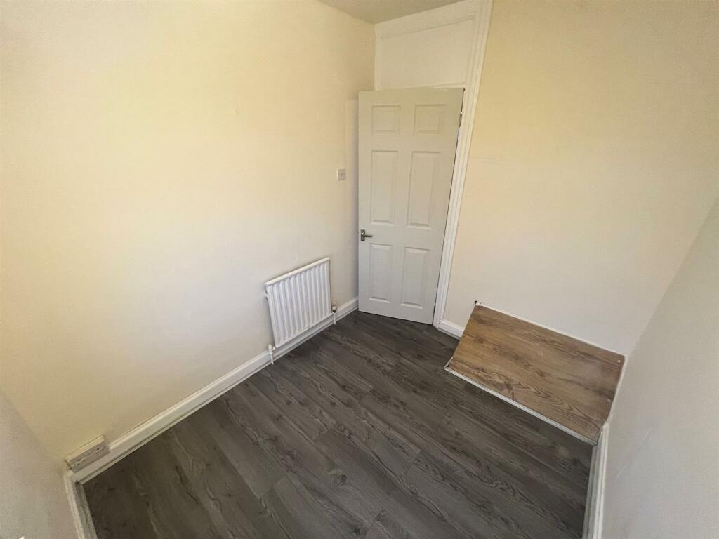 Front first floor single bedroom