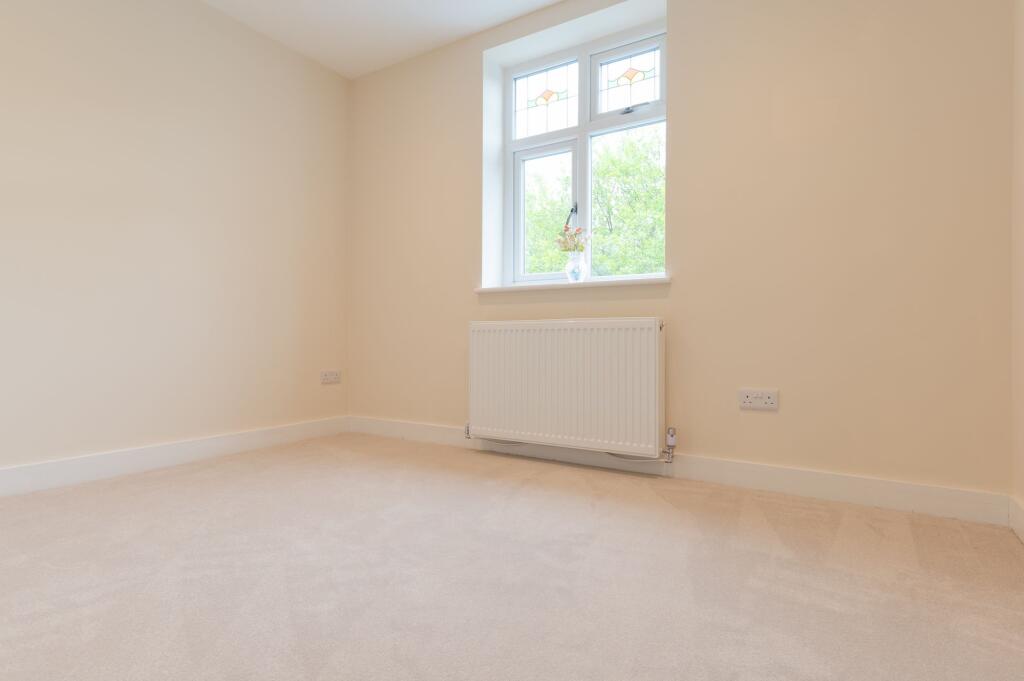 Four double bedrooms and two bathrooms