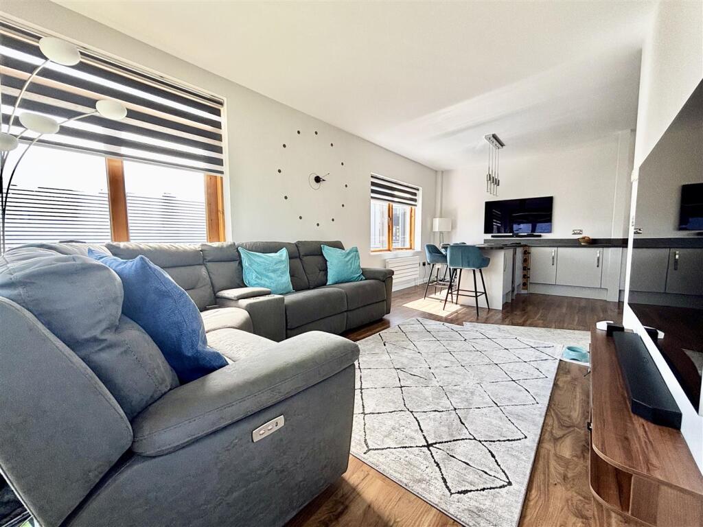 Kitchen/Dining/Family Room View Six