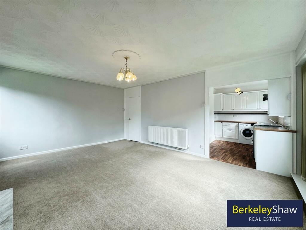 Living area to kitchen