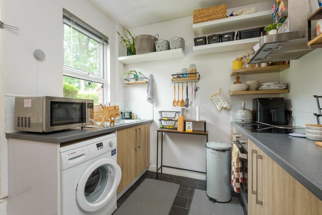 SITTING ROOM AND KITCHEN
