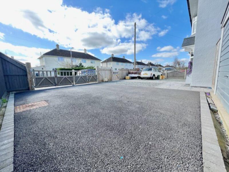 Front garden and parking view 2