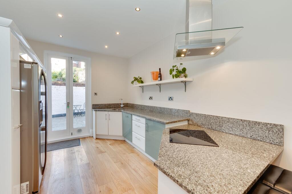 KITCHEN, DINER AND LIVING ROOM