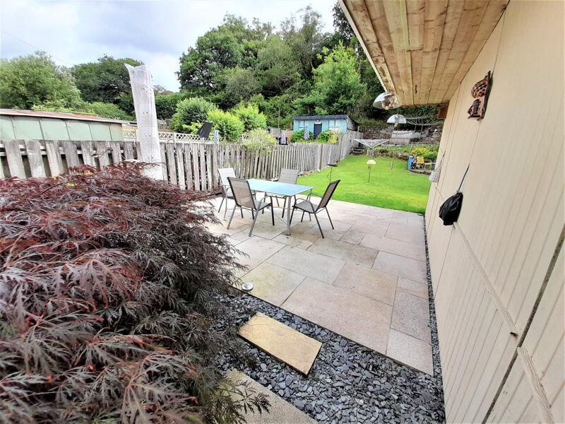 Further seating area leading to lawn