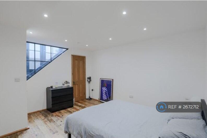 Bedroom 1, Natural Light From Patio Stairs