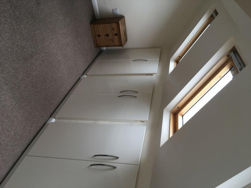 Bright and clean single bedroom featuring built...