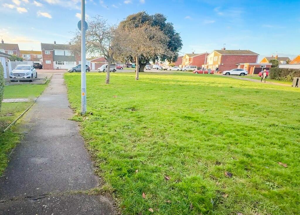 LOCAL GREENSWARD OPPOSITE