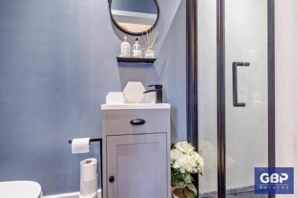 Downstairs Cloakroom / Shower Cubicle