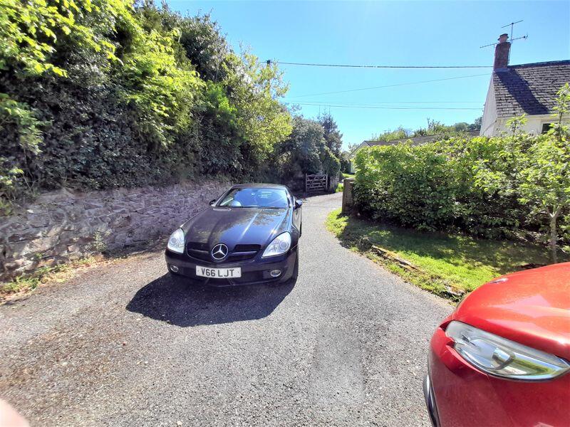 Gated Driveway and Plenty of Parking