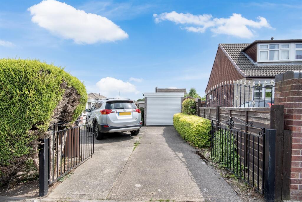 Drive and Detached Garage