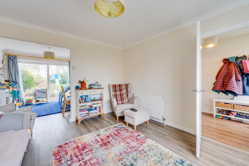 1.5.5 - lounge open to dining area.jpg