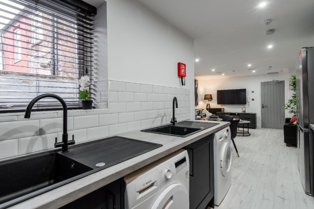 A modern and tidy kitchenette featuring stylish...