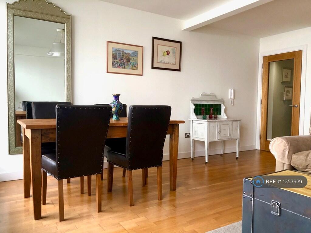Dining Area With Indian Silver Beaten Mirror