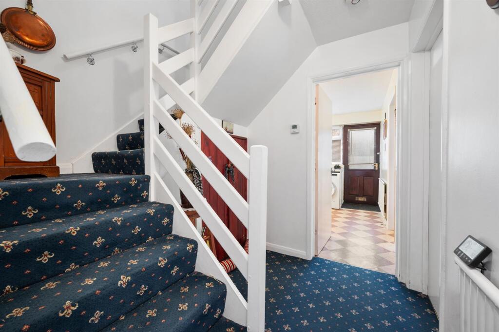 Entrance hallway - stairs and kitchen.jpg