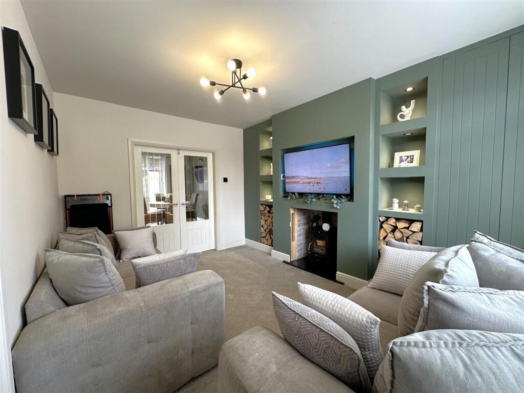 Lounge With Double Doors Into Kitchen 856