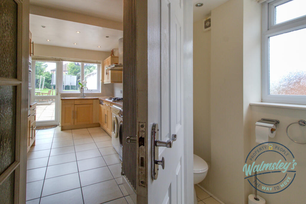 Ground floor cloakroom &amp; kitchen beyond