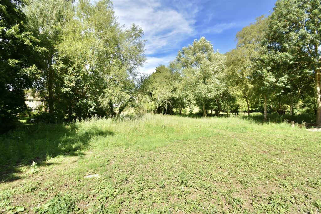 1/2 acre river frontage included!