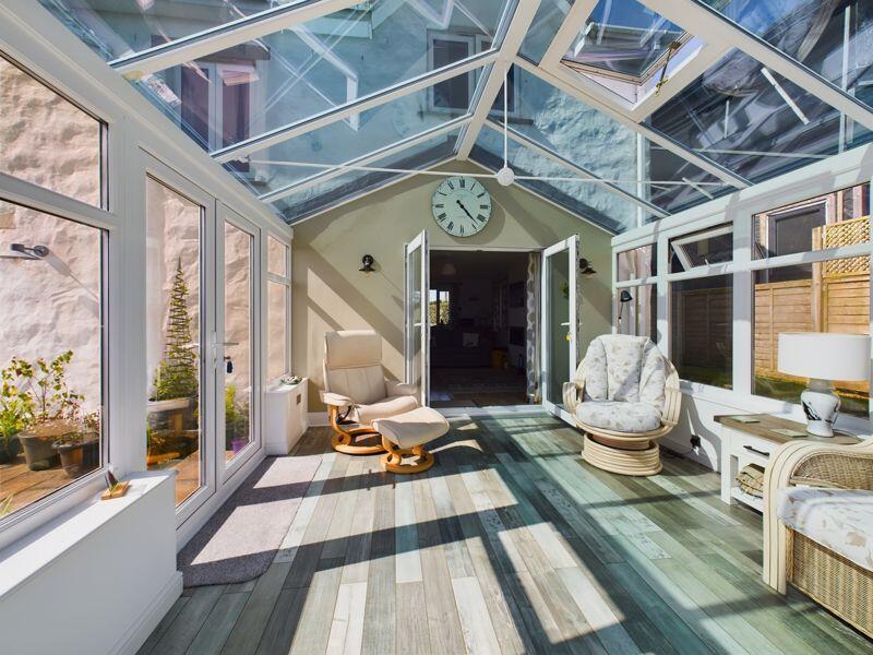 Conservatory back through to Lounge