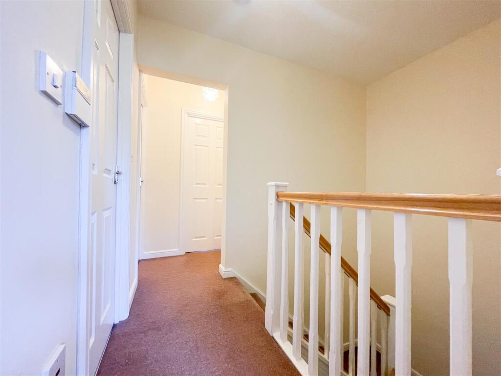 STAIRS TO SECOND FLOOR LANDING