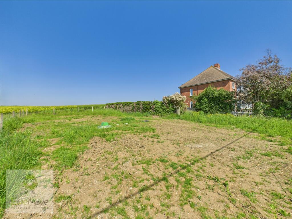 Land Adjacent To The Side Of The Property