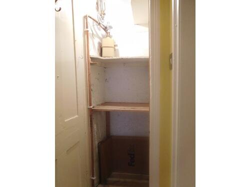 cupboard hallway - gas meter.JPG
